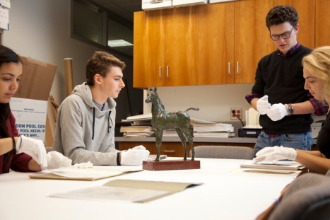 Leah Niederstadt and students work with the Arab Filly statue